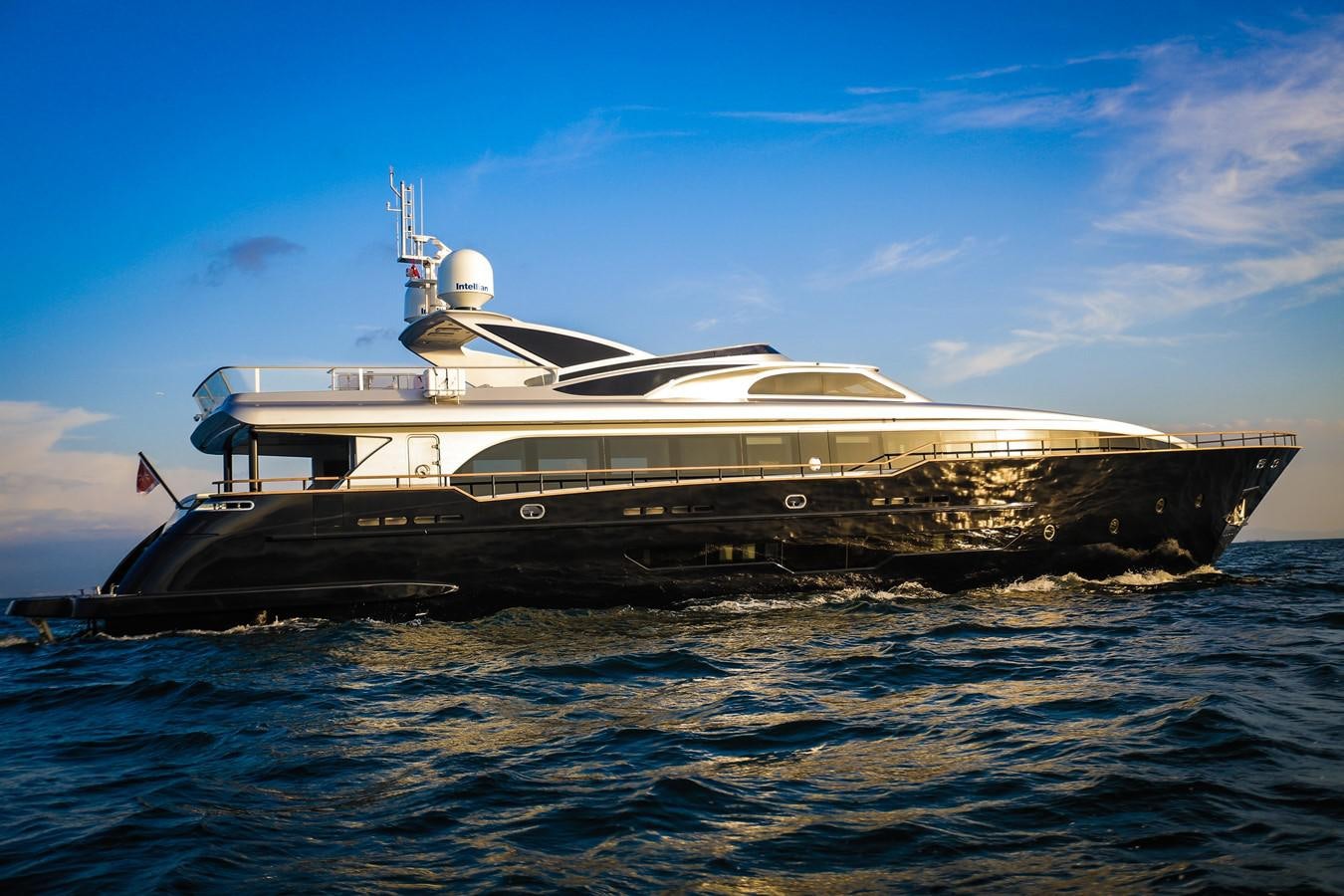 a large ship in the water aboard HARUN Yacht for Sale