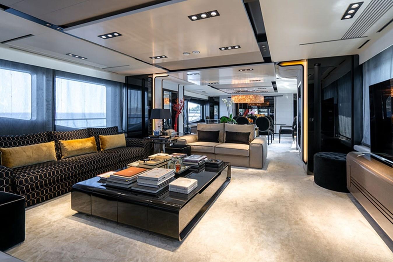 a living room with a couch and a coffee table aboard SAFFURIYA Yacht for Sale