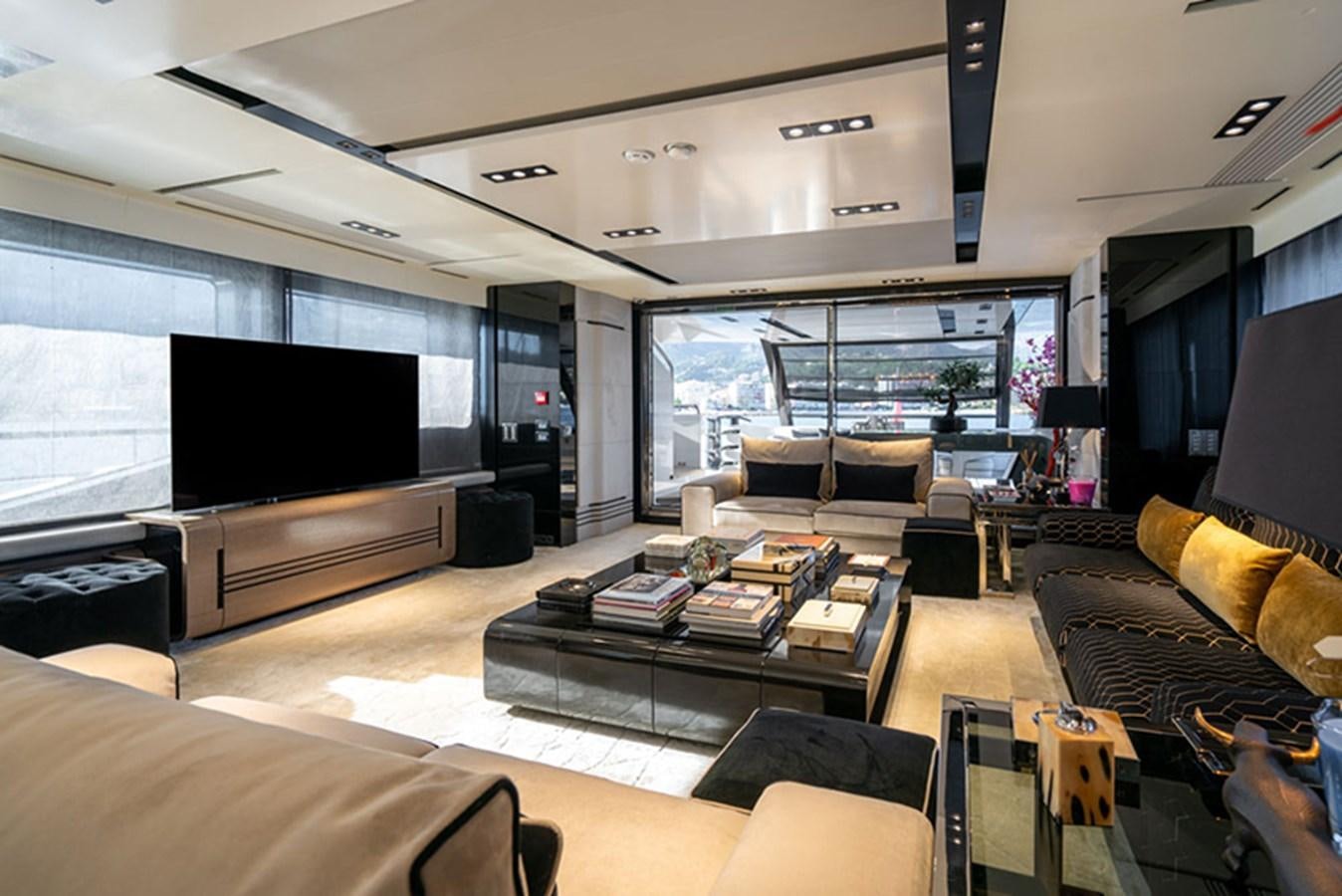 a living room with a large tv aboard SAFFURIYA Yacht for Sale