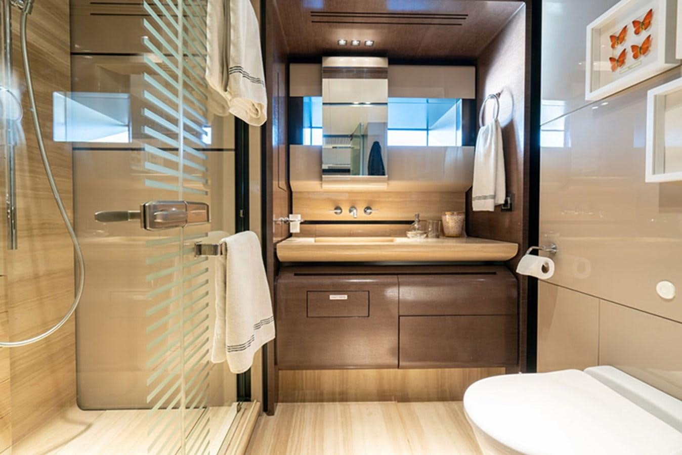 a bathroom with a glass shower aboard SAFFURIYA Yacht for Sale