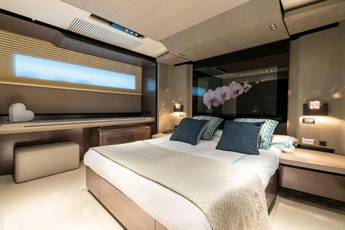a room with a bed and a tv aboard SAFFURIYA Yacht for Sale