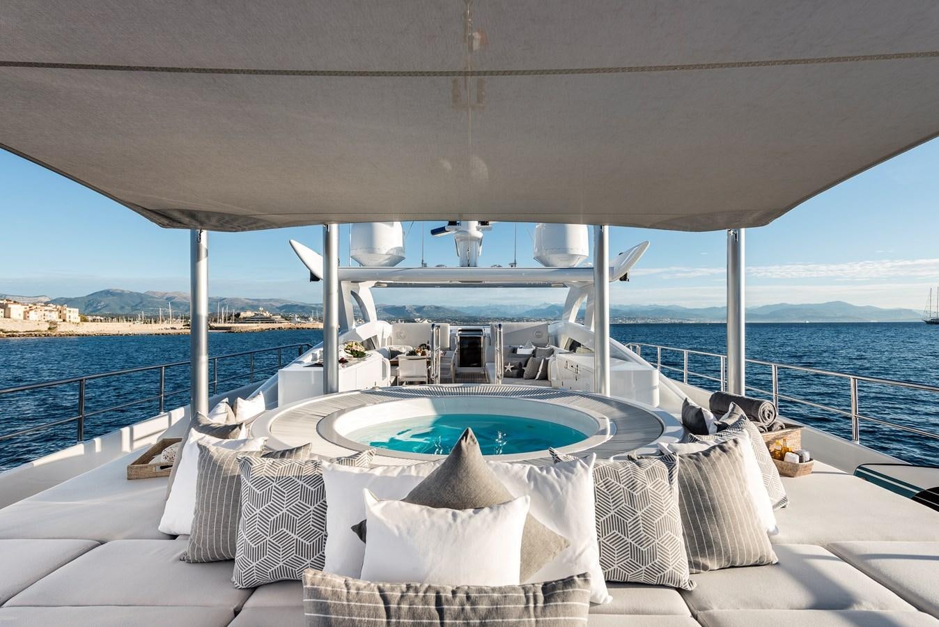 a large white bed on a boat aboard ANGKALIA Yacht for Sale
