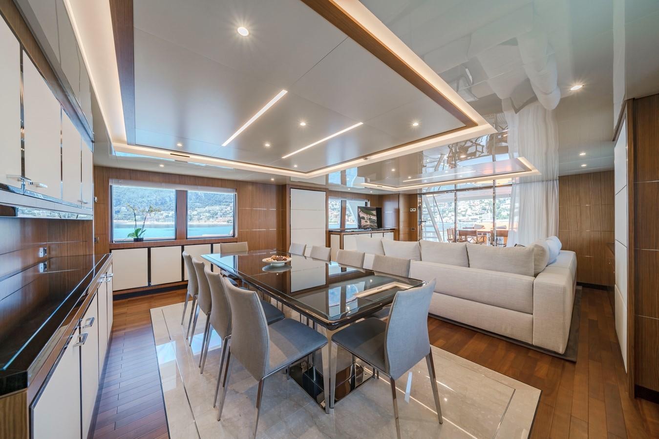 a living room with a couch and a table aboard FIORENTE Yacht for Sale
