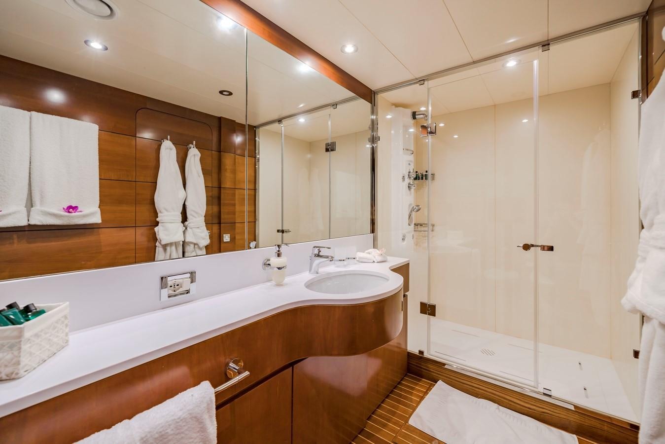 a bathroom with a large mirror aboard FIORENTE Yacht for Sale
