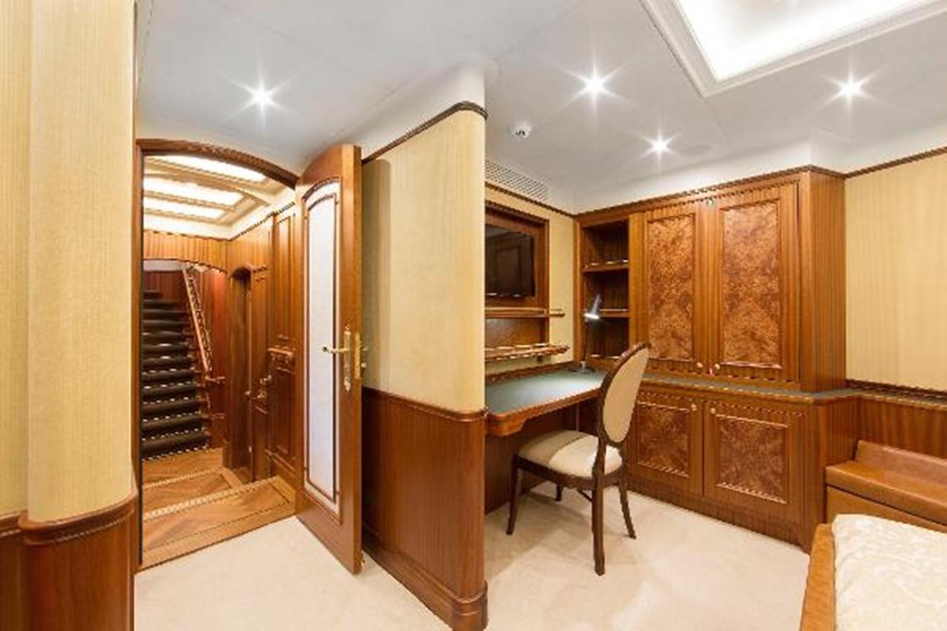a room with a desk and a chair aboard 121FT EXPLORER 37 Yacht for Sale