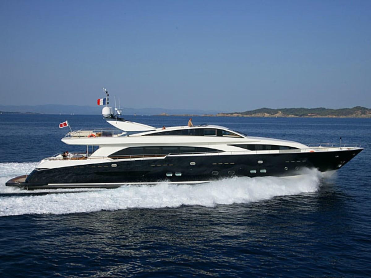a boat on the water aboard COUACH 120 Yacht for Sale