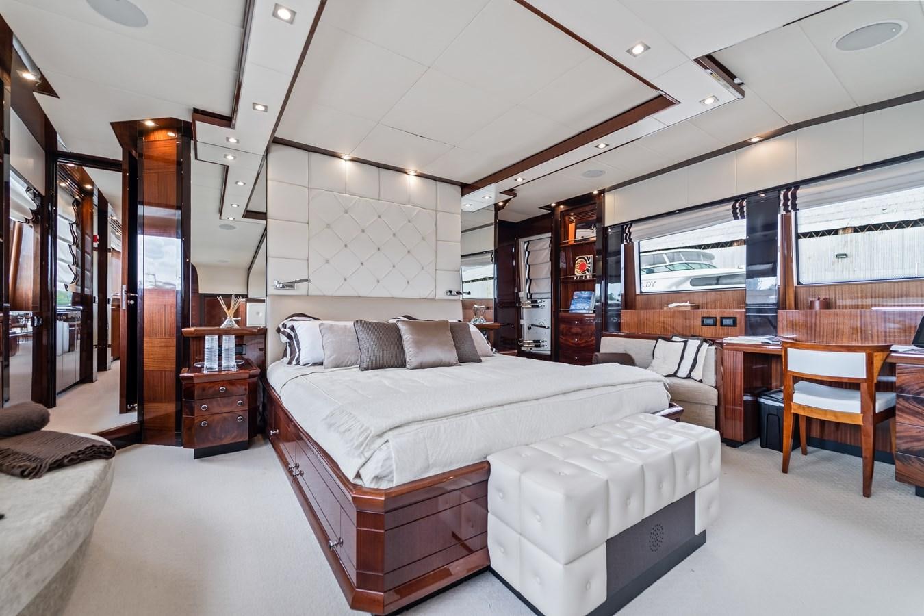 a large bedroom with a bed aboard HAPPY HOUR Yacht for Sale