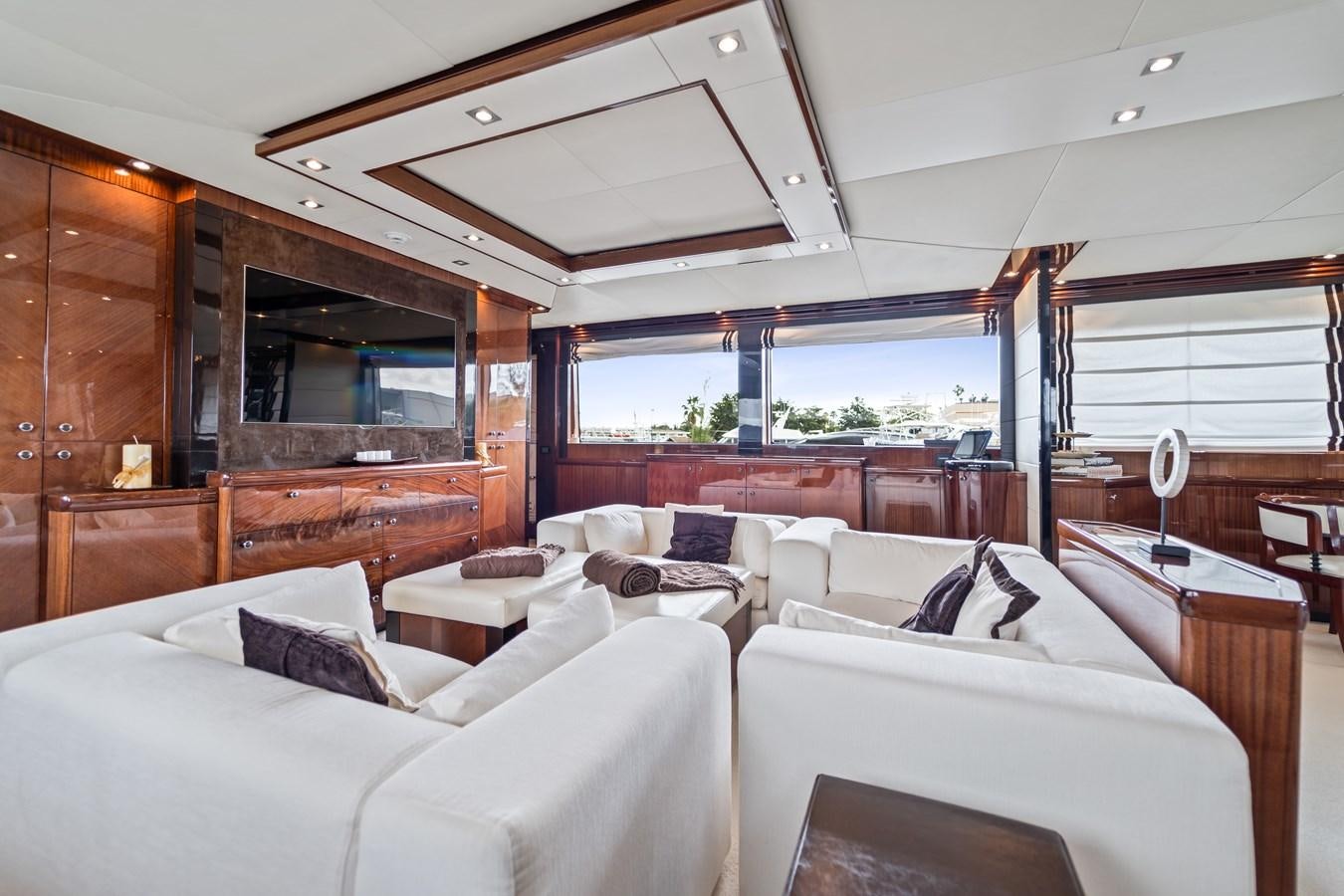 a room with a bed and a window aboard HAPPY HOUR Yacht for Sale