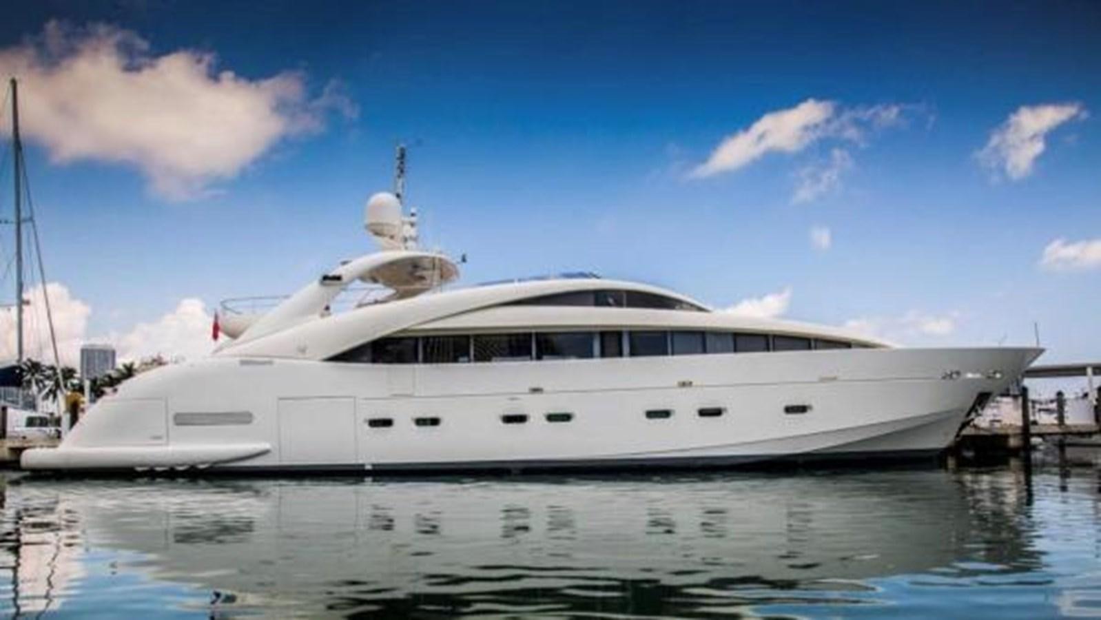 a white yacht on the water aboard HAPPY HOUR Yacht for Sale
