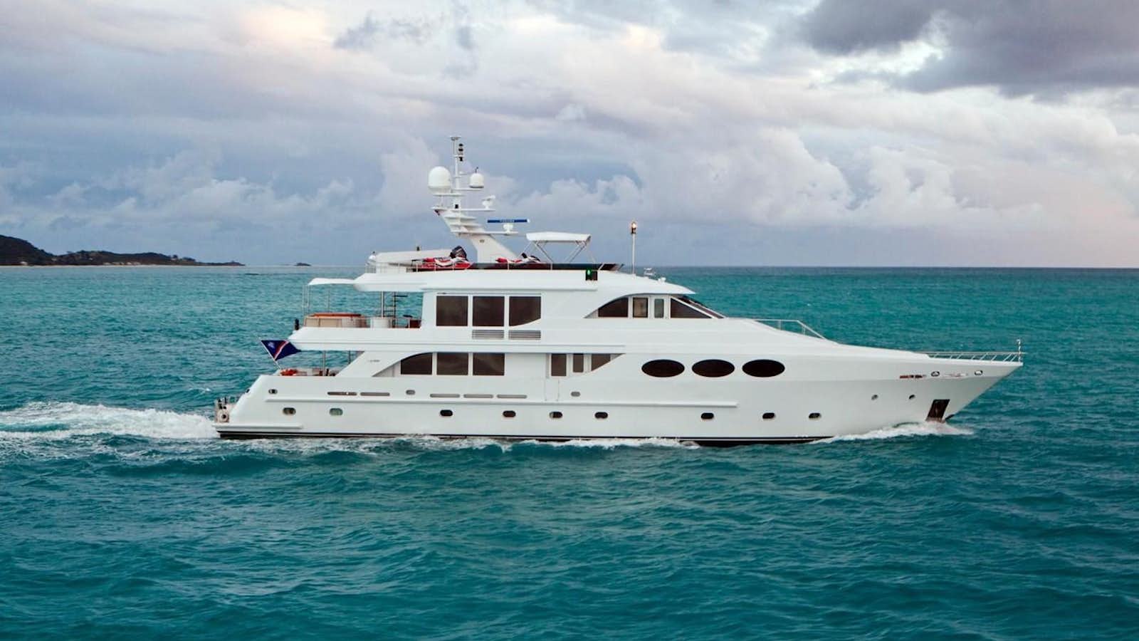 a white boat in the water aboard NO NAME  2002 120 TRI-DECK M/Y Yacht for Sale