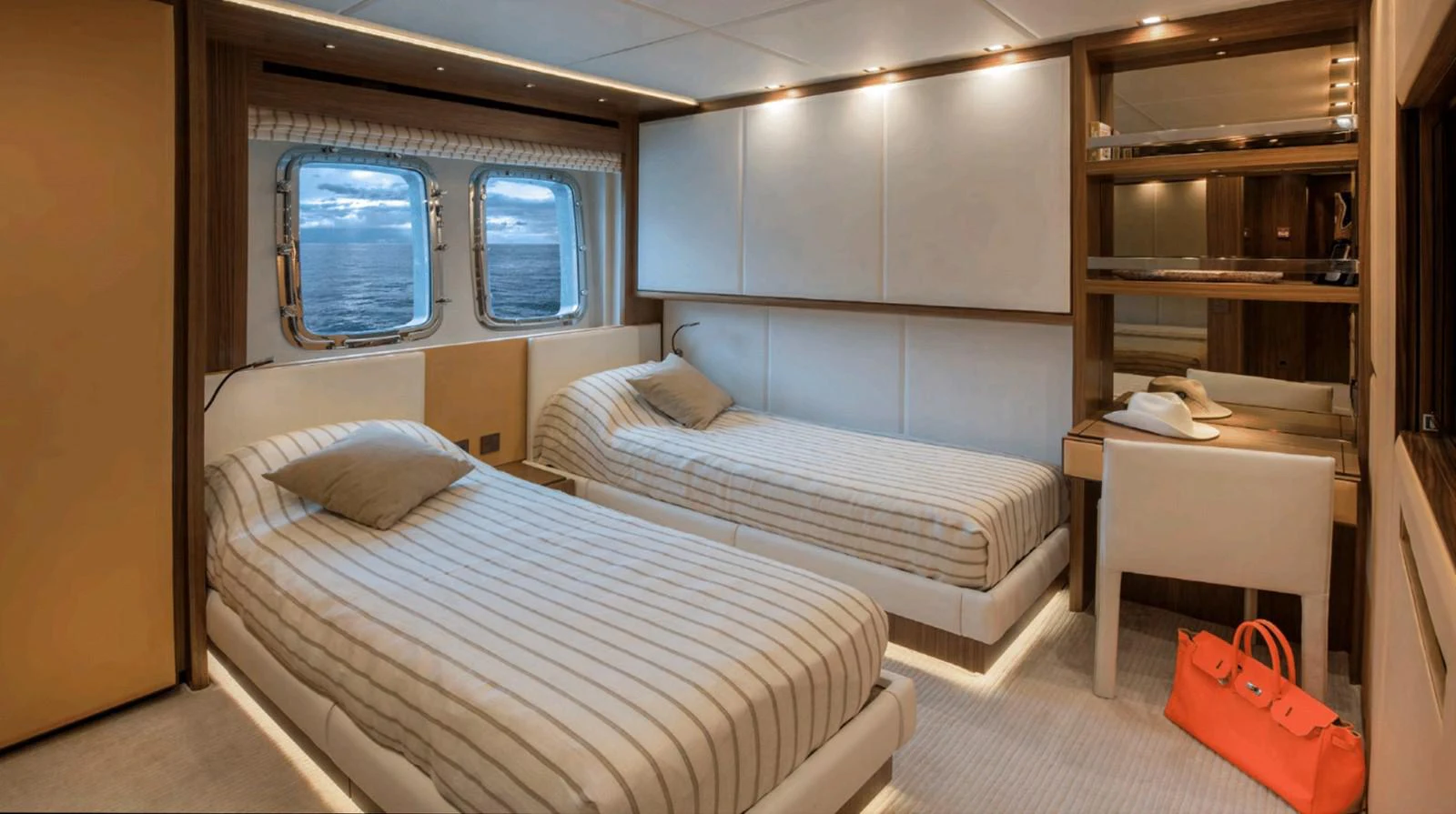 a room with two beds aboard TOUTE SWEET Yacht for Sale