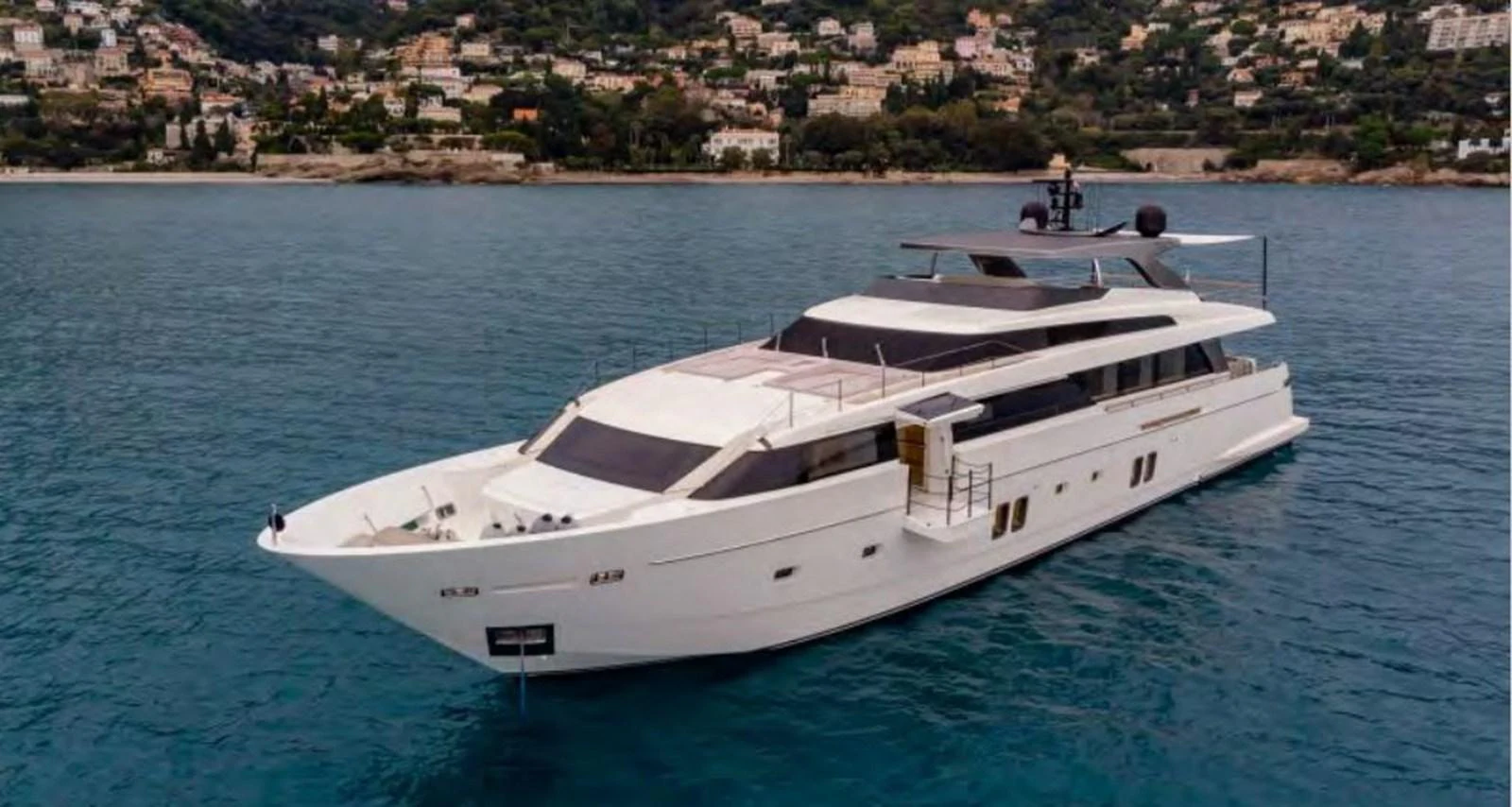 a white yacht in the water aboard HAIIA Yacht for Sale