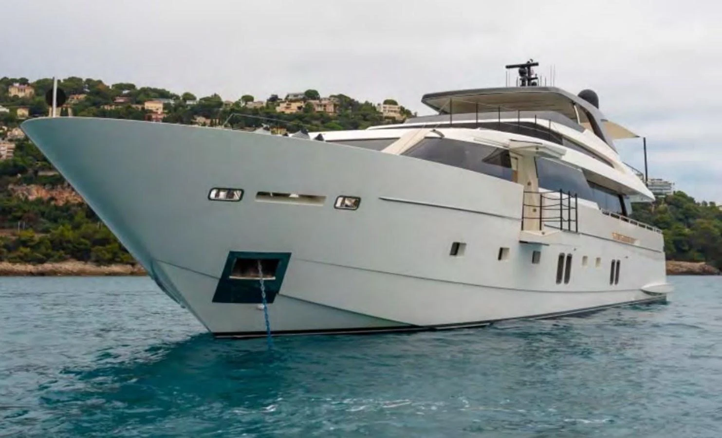 a large white boat in the water aboard HAIIA Yacht for Sale