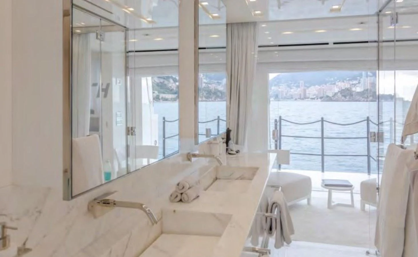 a room with a bed and a window aboard HAIIA Yacht for Sale
