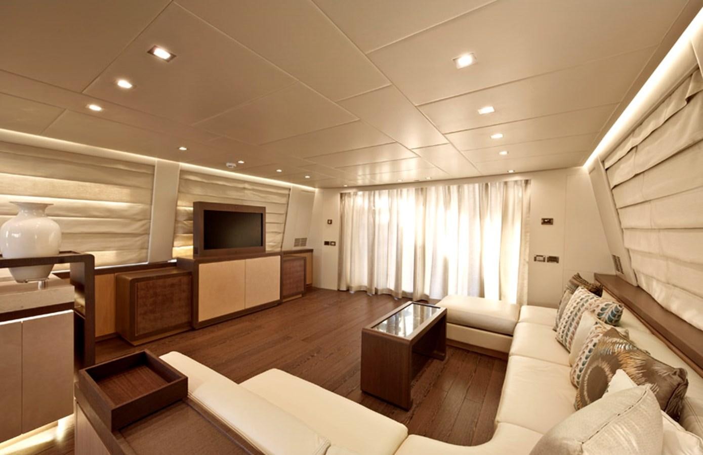 a living room with a large window aboard MUSA Yacht for Sale