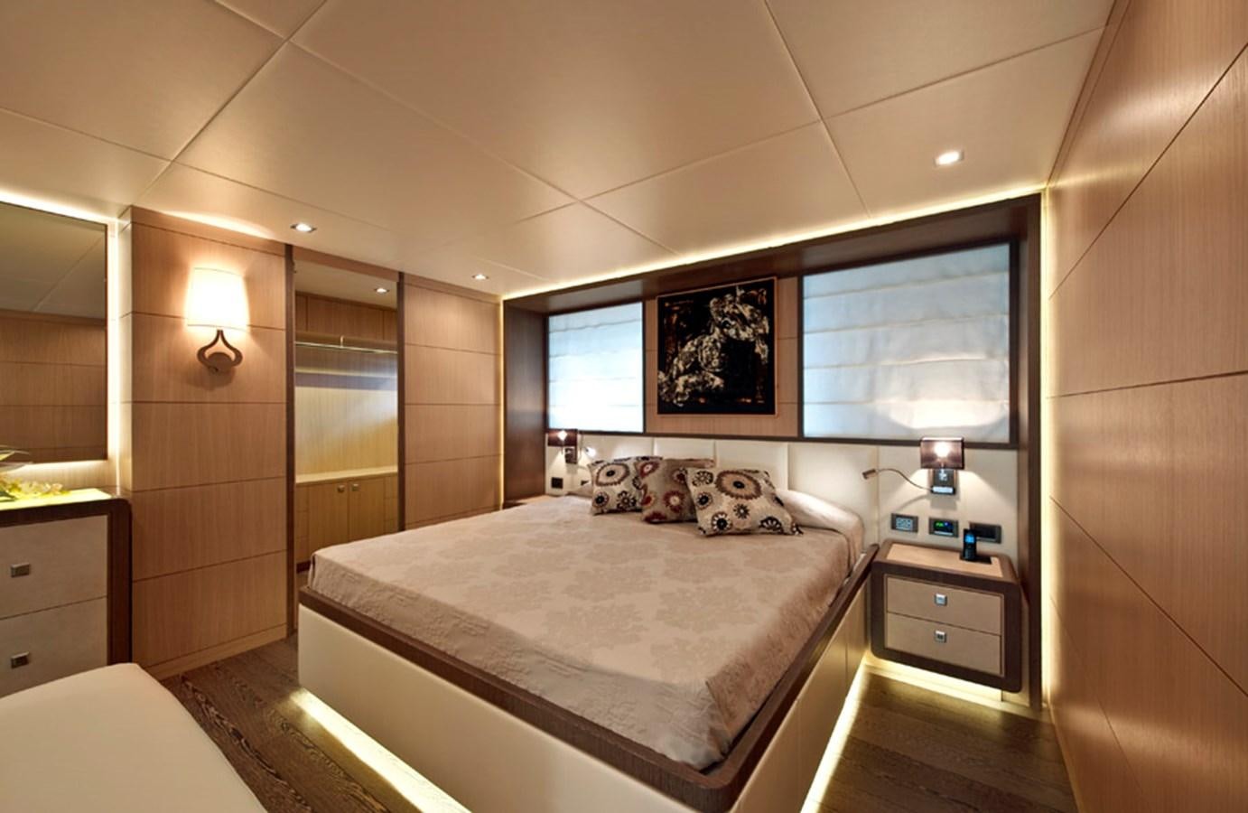 a bed in a room aboard MUSA Yacht for Sale