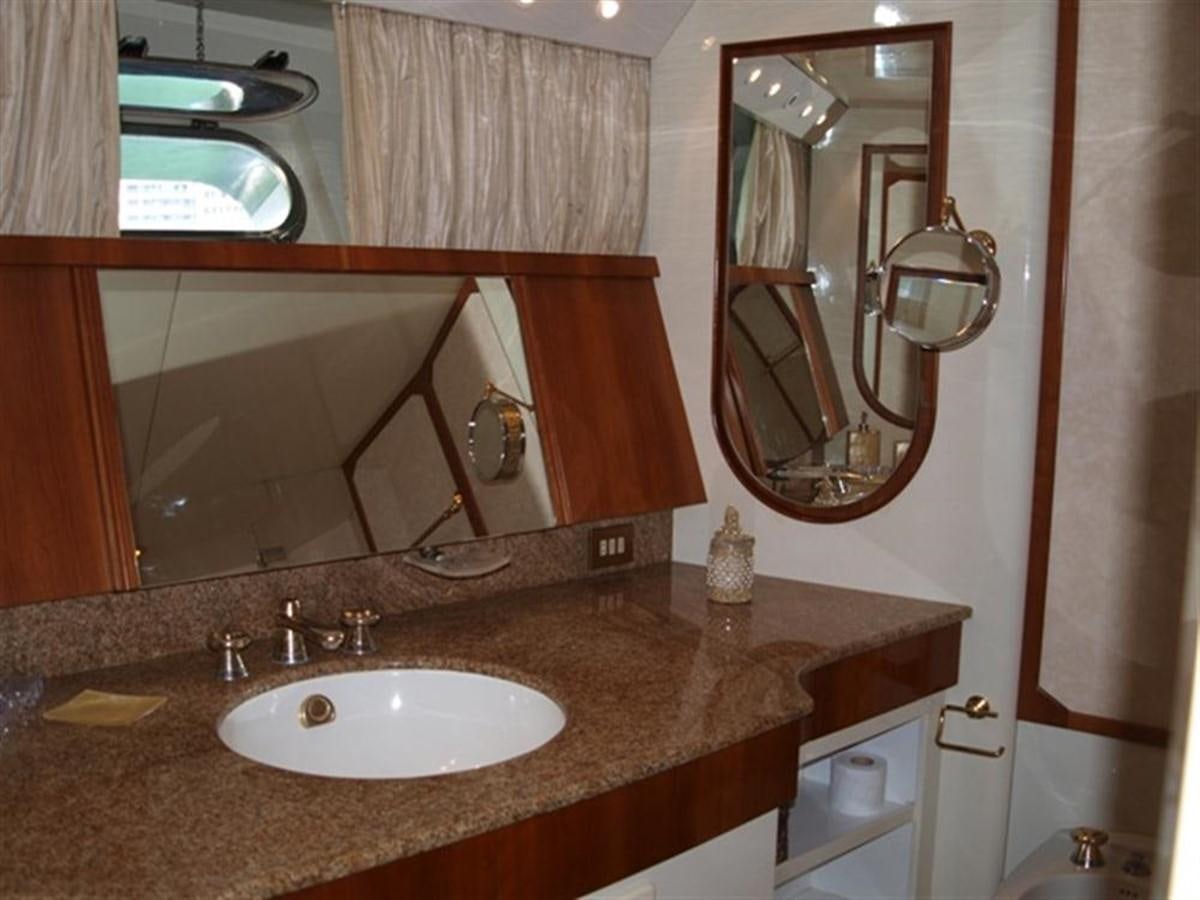 a bathroom with a large mirror aboard PARADIS Yacht for Sale