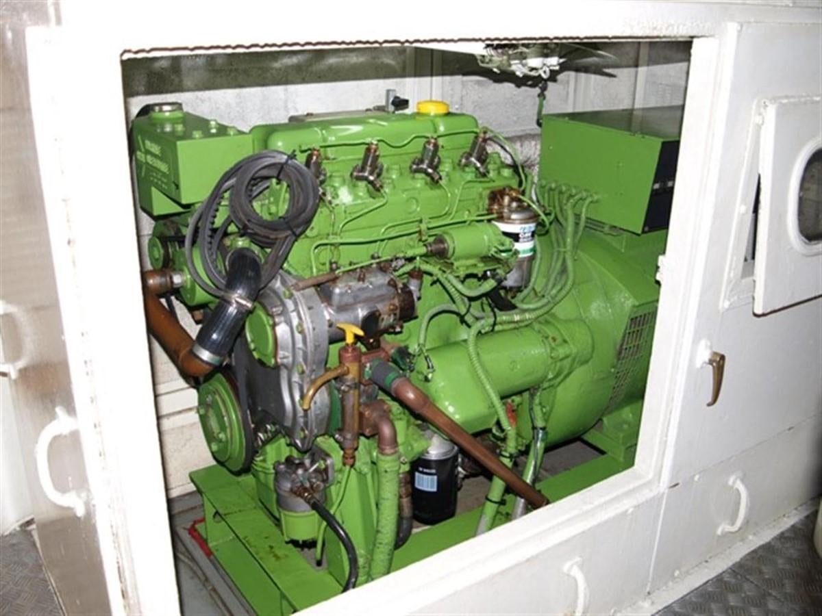 a green machine with a large green engine aboard PARADIS Yacht for Sale