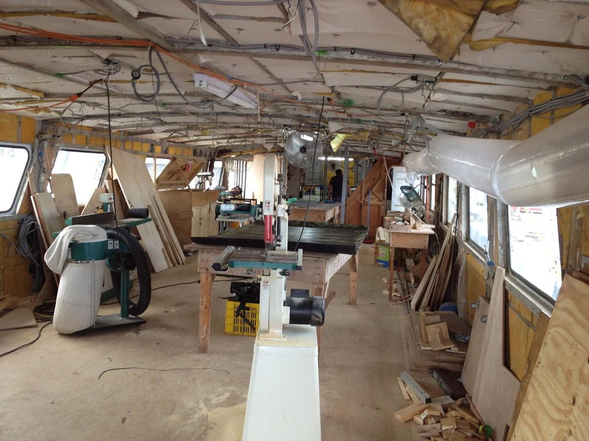 a room with a lot of tools aboard CALLISTO Yacht for Sale