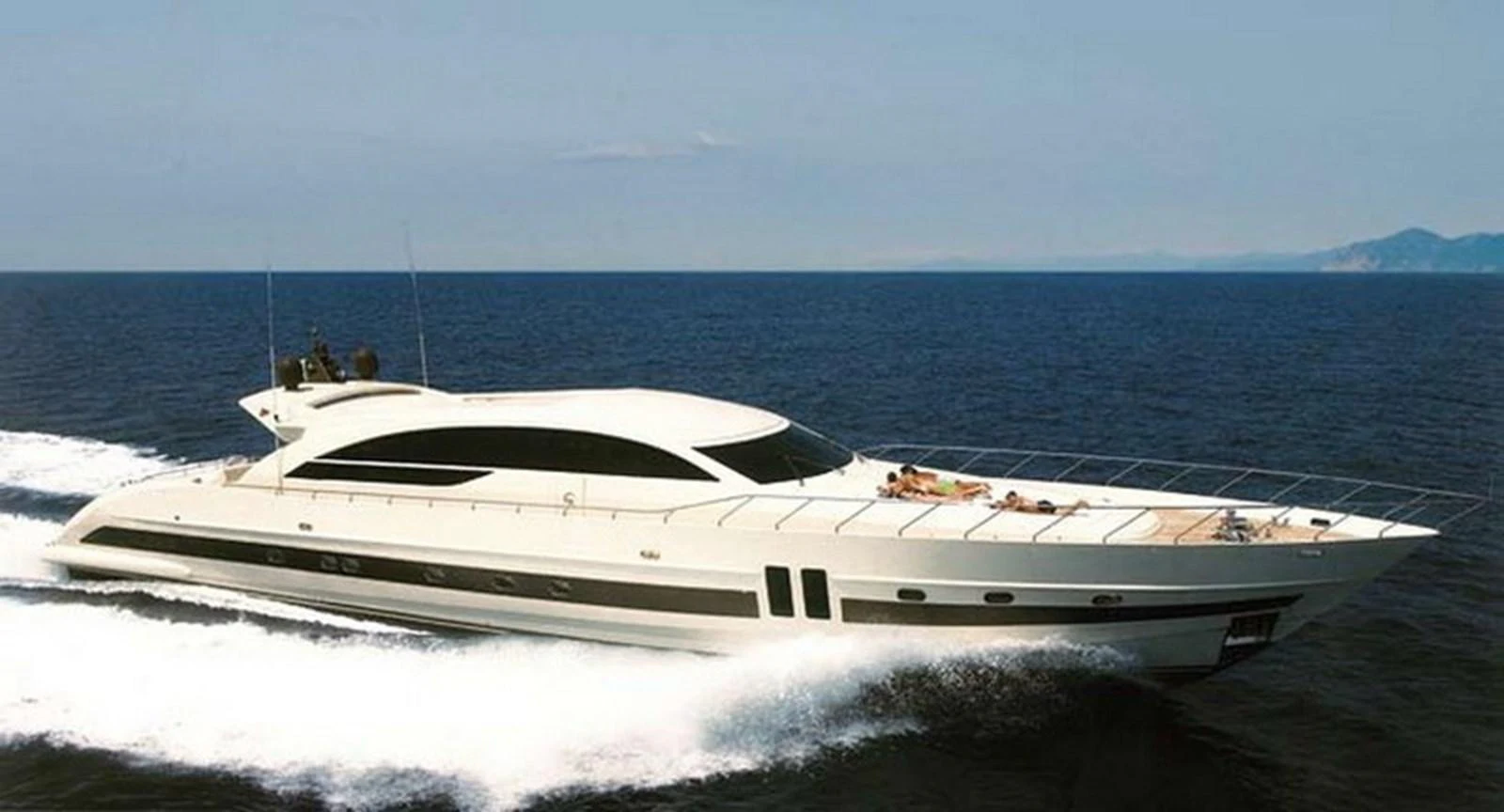 a white yacht on the beach aboard GINEVRA Yacht for Charter