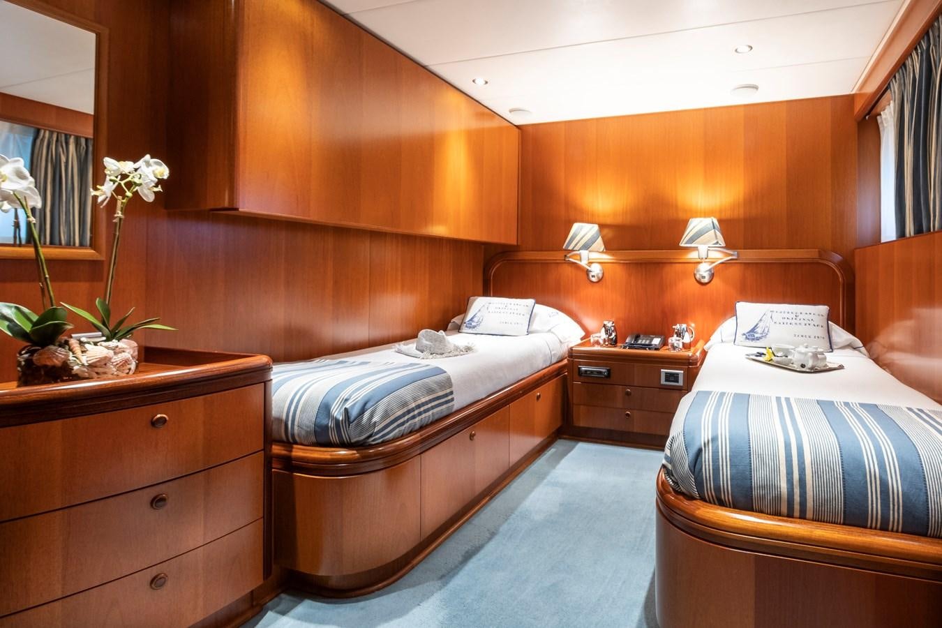 a room with two beds aboard ALCOR Yacht for Charter