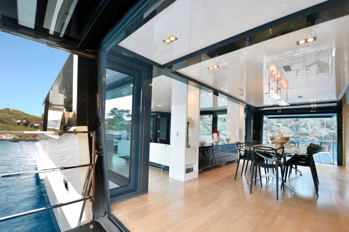 a modern house with a pool aboard SUN Yacht for Sale