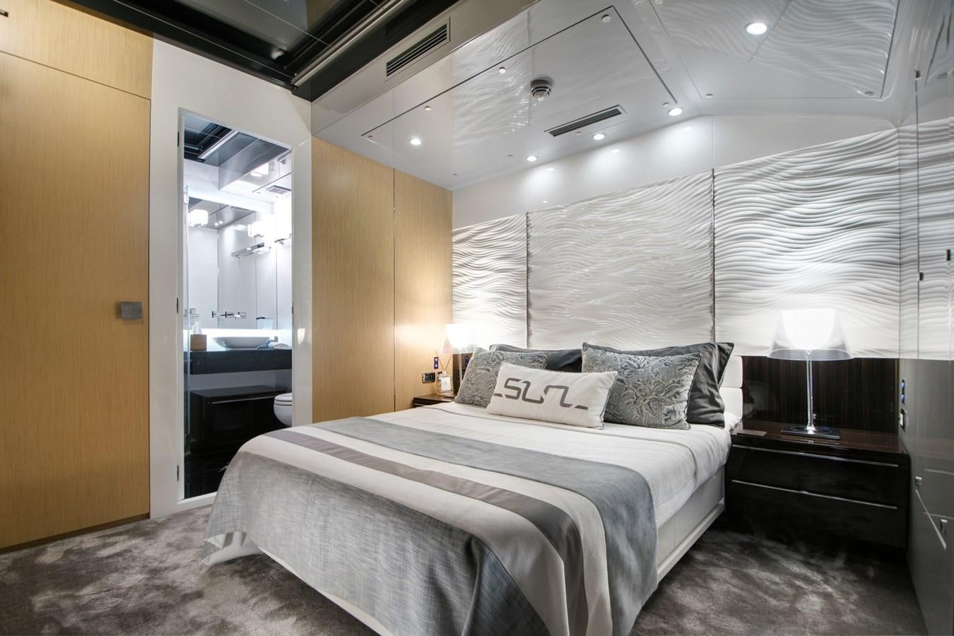 a bed in a room aboard SUN Yacht for Sale