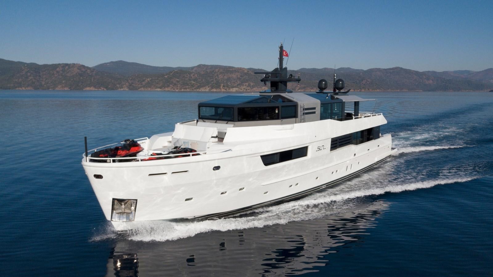 a boat on the water aboard SUN Yacht for Sale