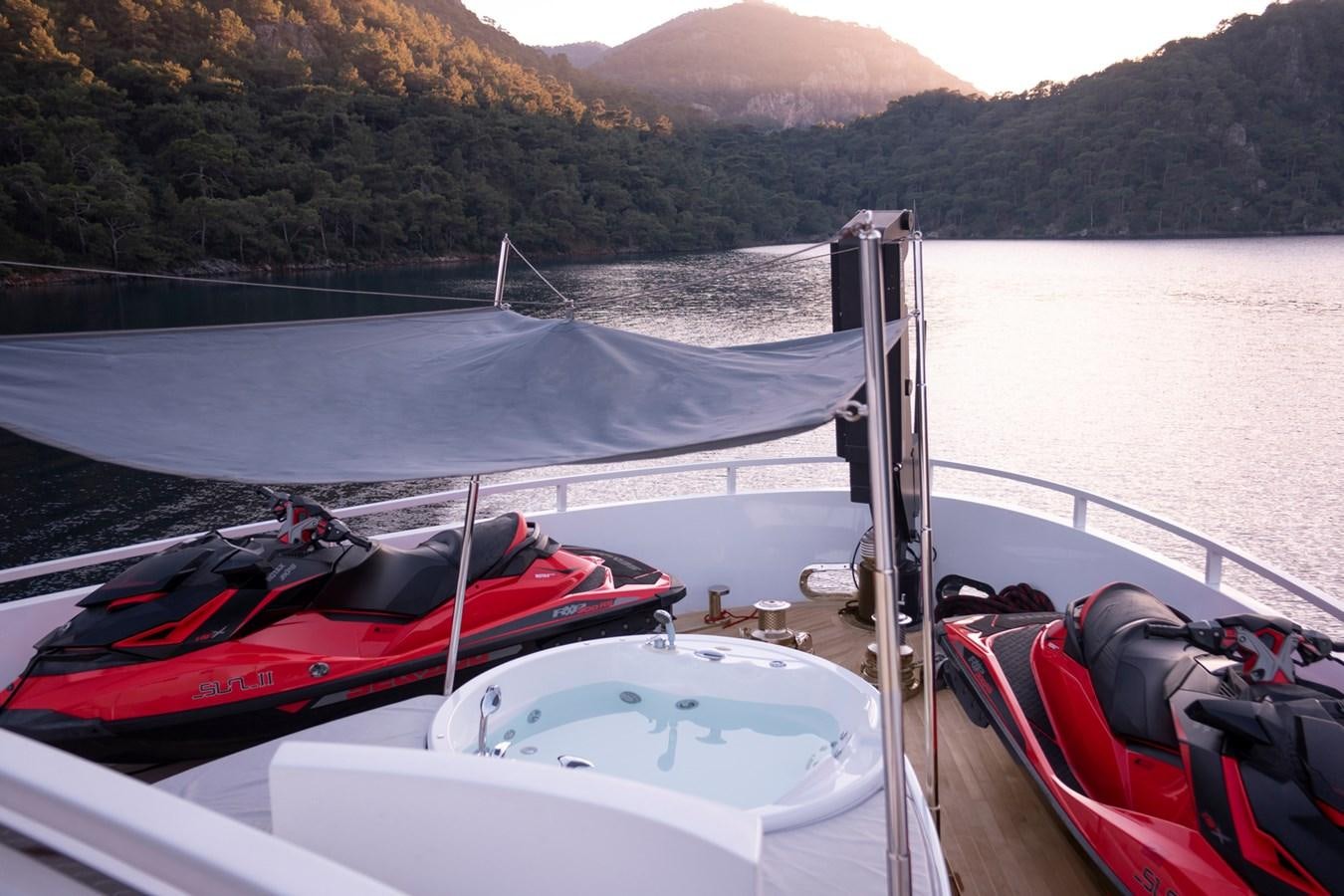 a boat on the water aboard SUN Yacht for Sale