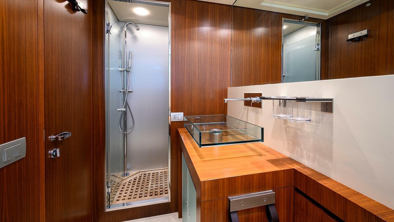 a kitchen with a glass shower aboard BEYOND Yacht for Sale