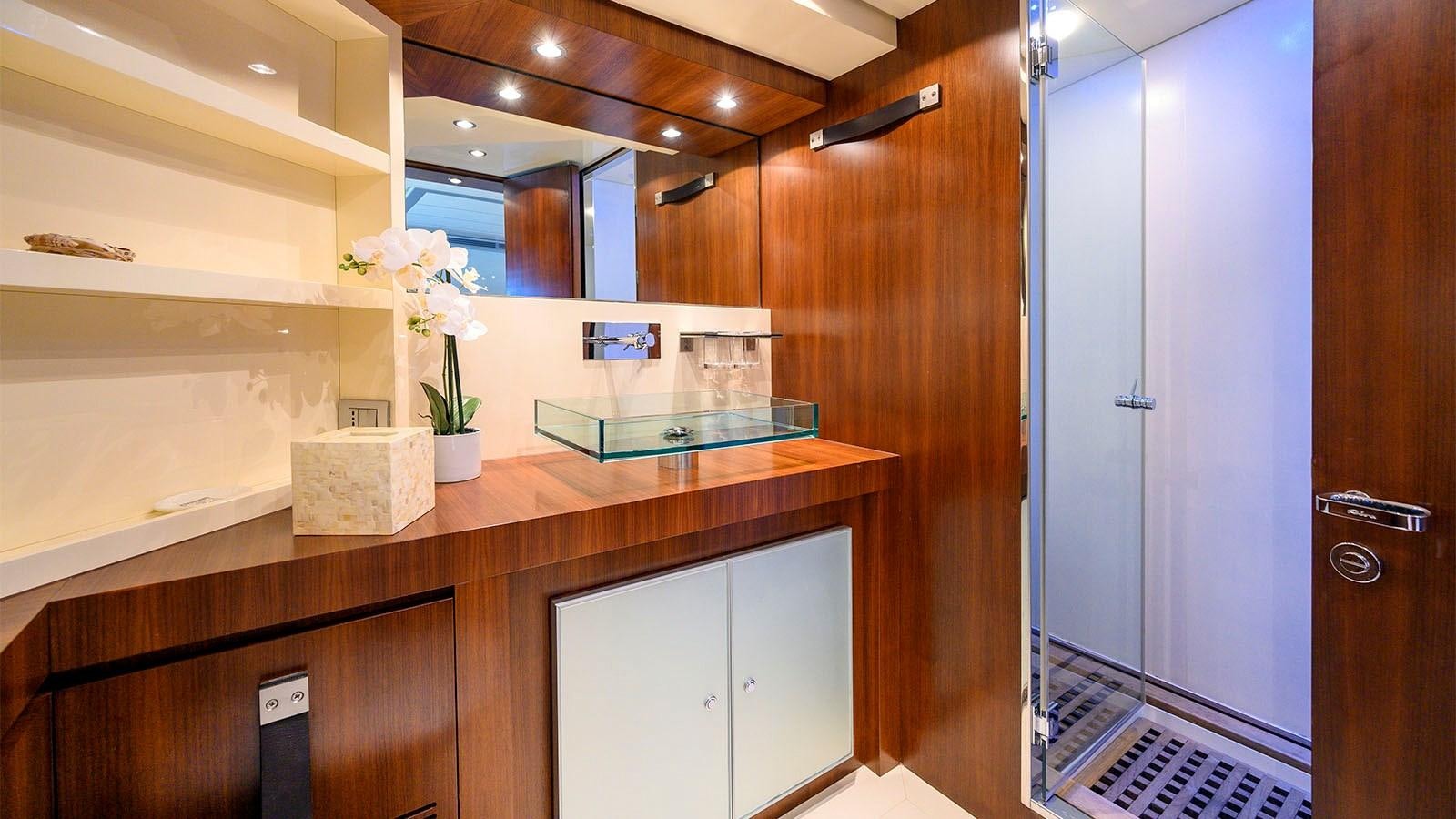 a room with a counter and cabinets aboard BEYOND Yacht for Sale