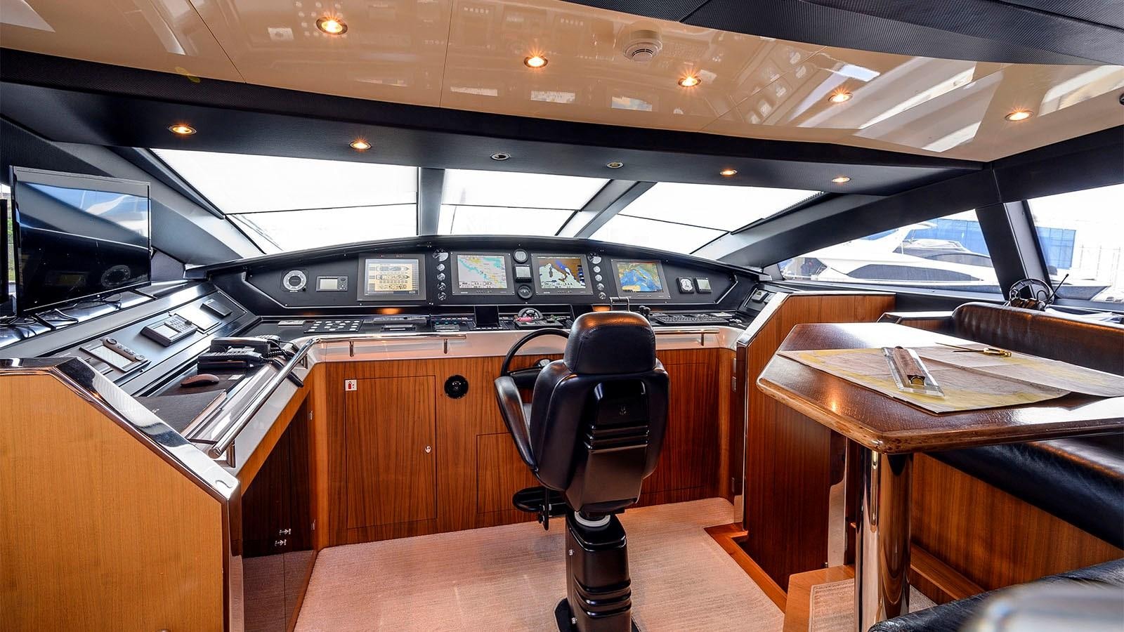 a black chair in a room aboard BEYOND Yacht for Sale