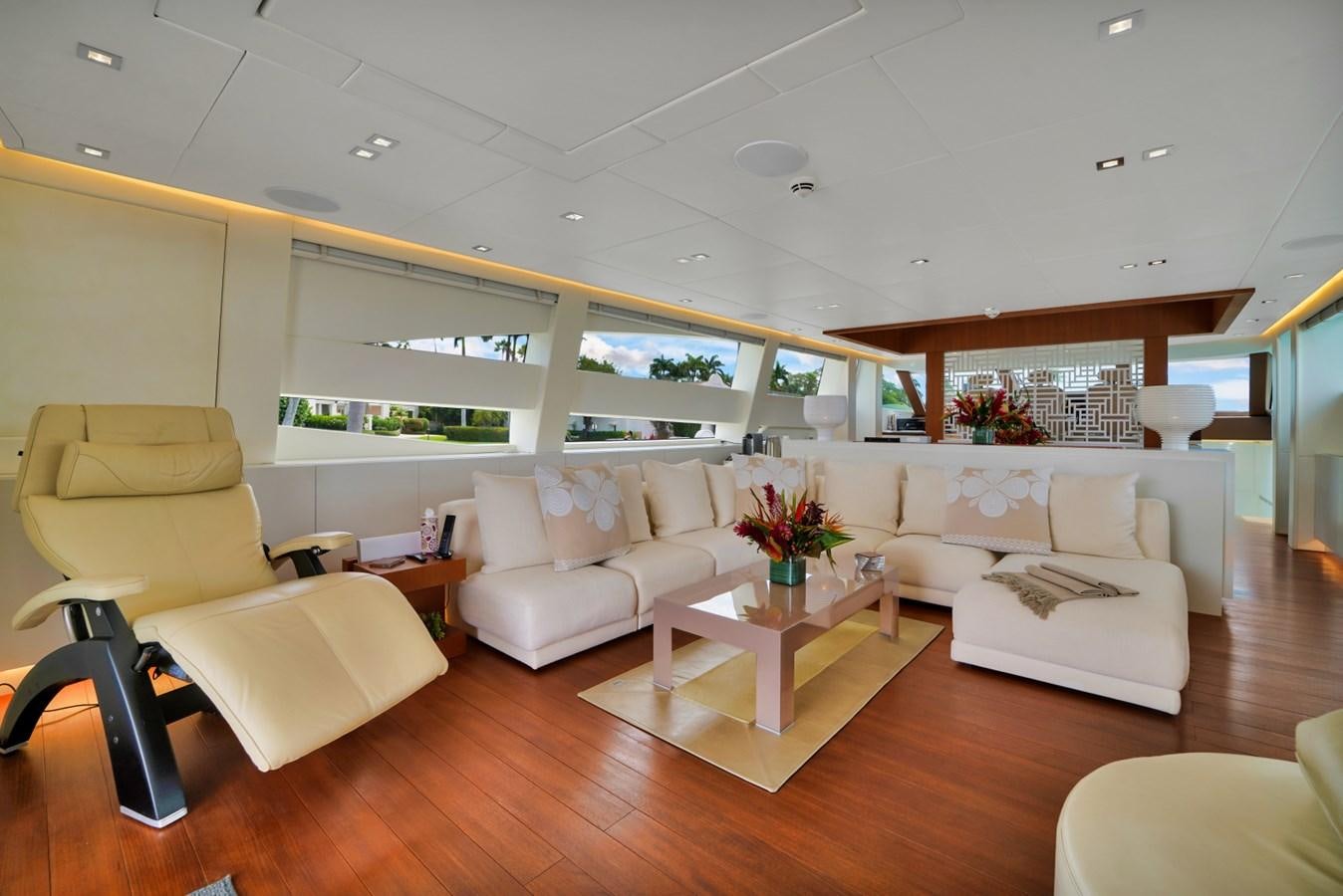 a living room with a couch and a coffee table aboard DIAMOND Yacht for Sale