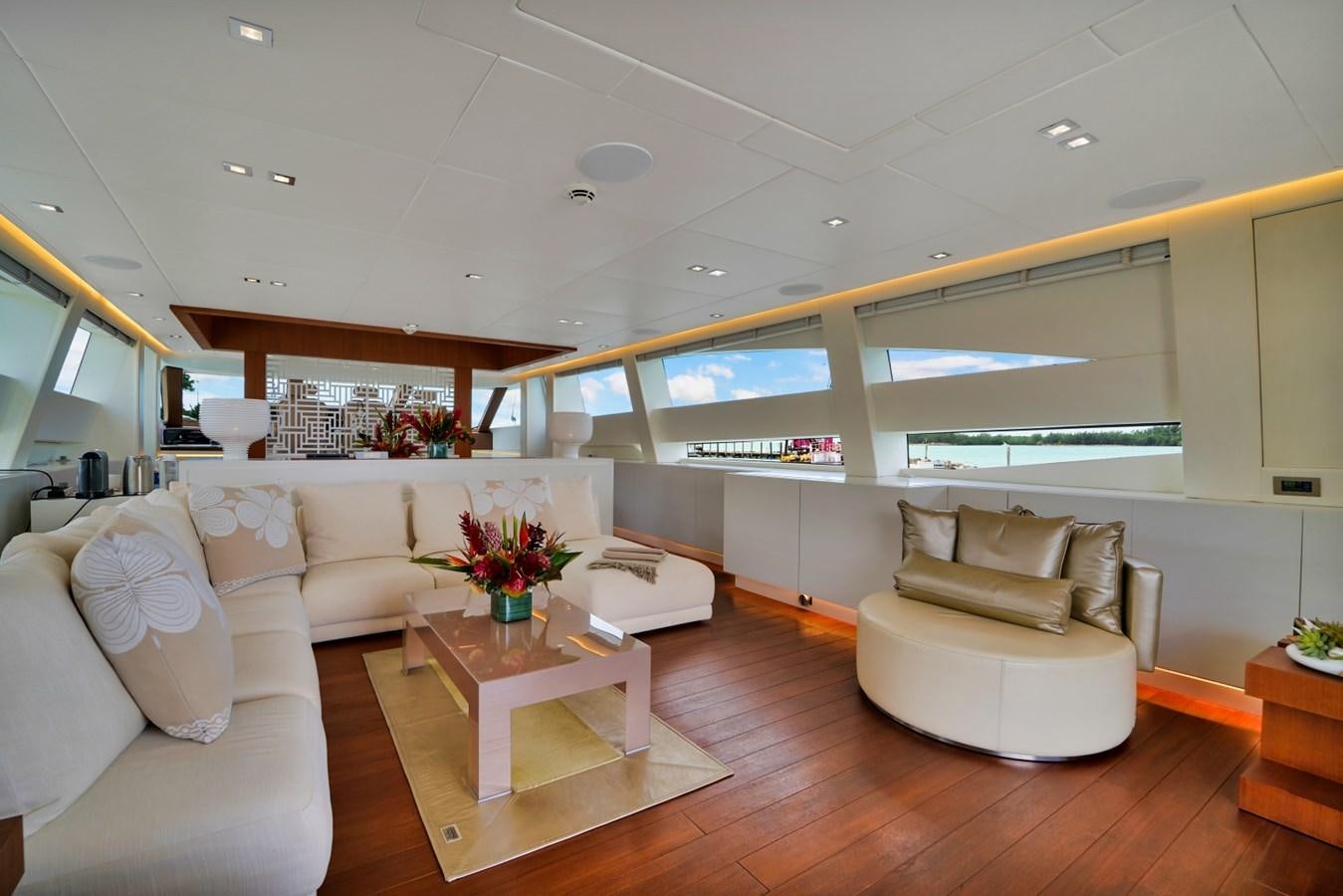 a living room with a wood floor aboard DIAMOND Yacht for Sale