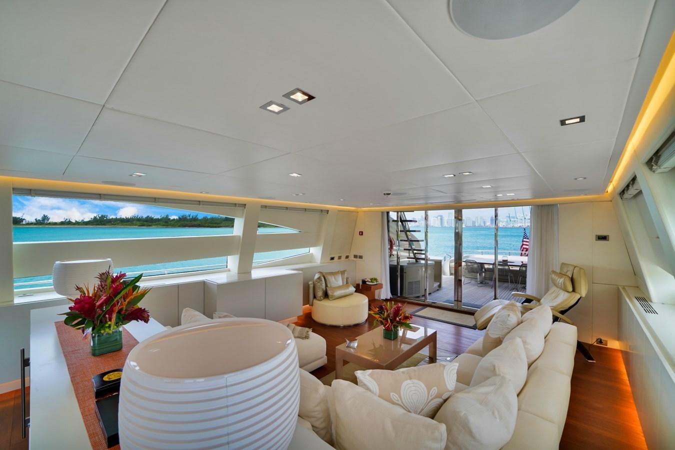 a living room with a large window aboard DIAMOND Yacht for Sale