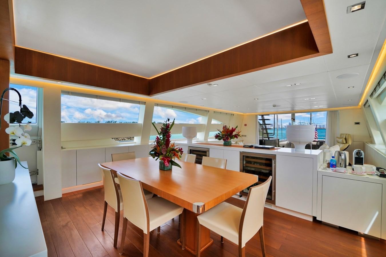 a kitchen with a table and chairs aboard DIAMOND Yacht for Sale