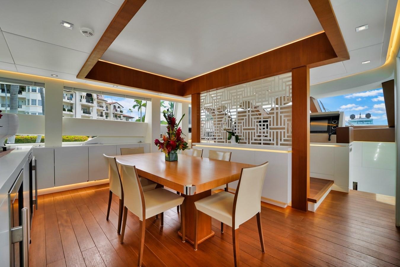 a room with a table and chairs aboard DIAMOND Yacht for Sale