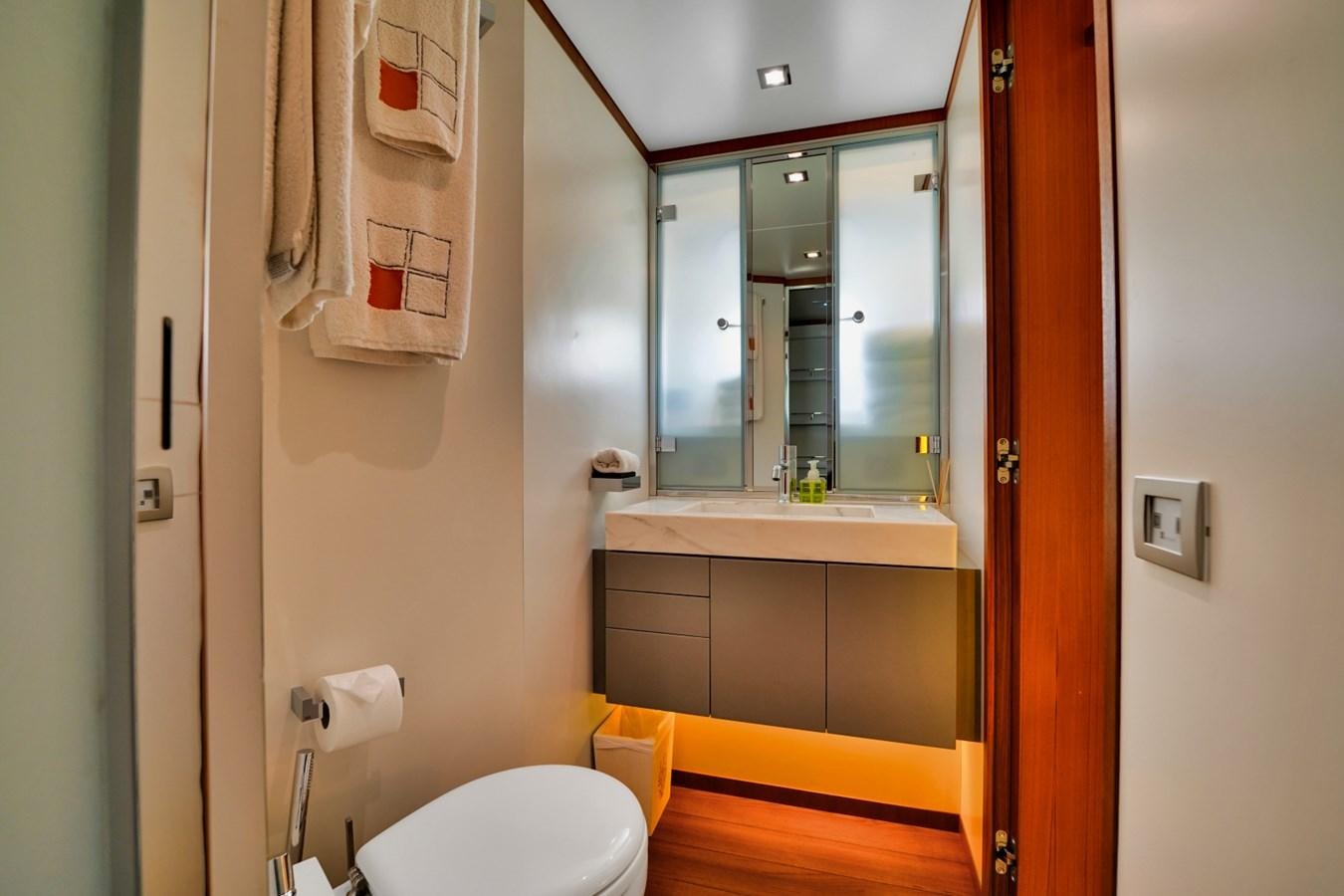 a bathroom with a sink and a mirror aboard DIAMOND Yacht for Sale