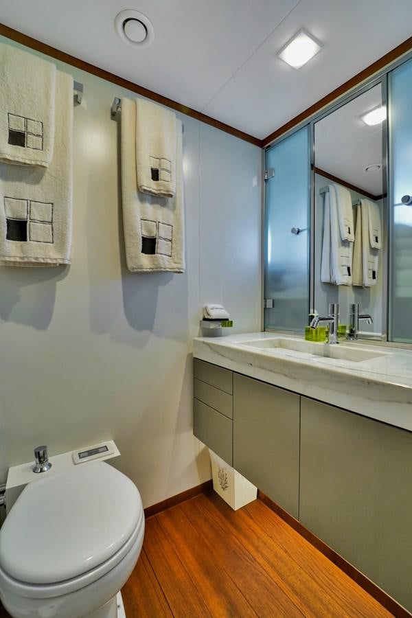 a bathroom with a large mirror aboard DIAMOND Yacht for Sale