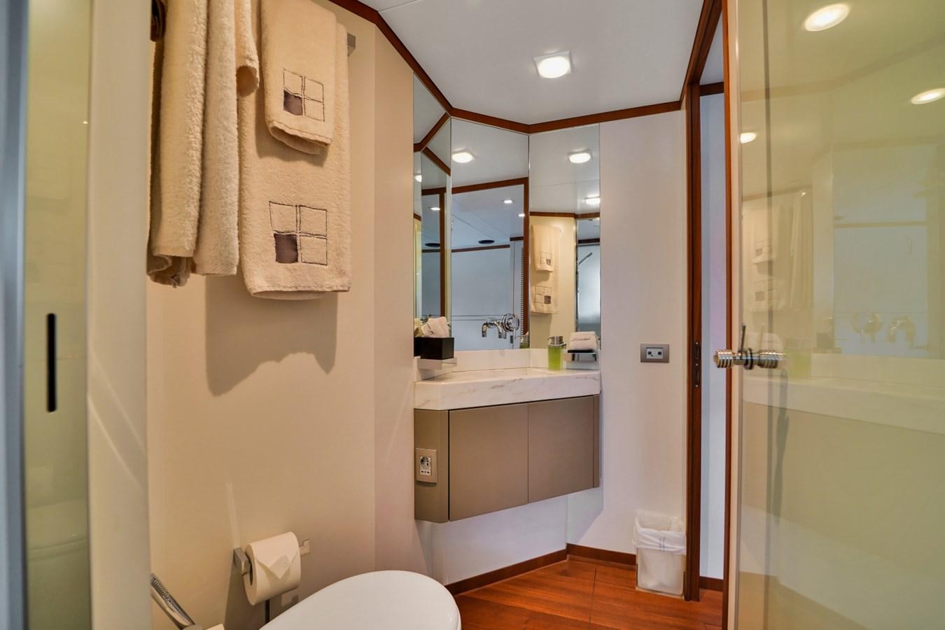 a bathroom with a sink and a mirror aboard DIAMOND Yacht for Sale