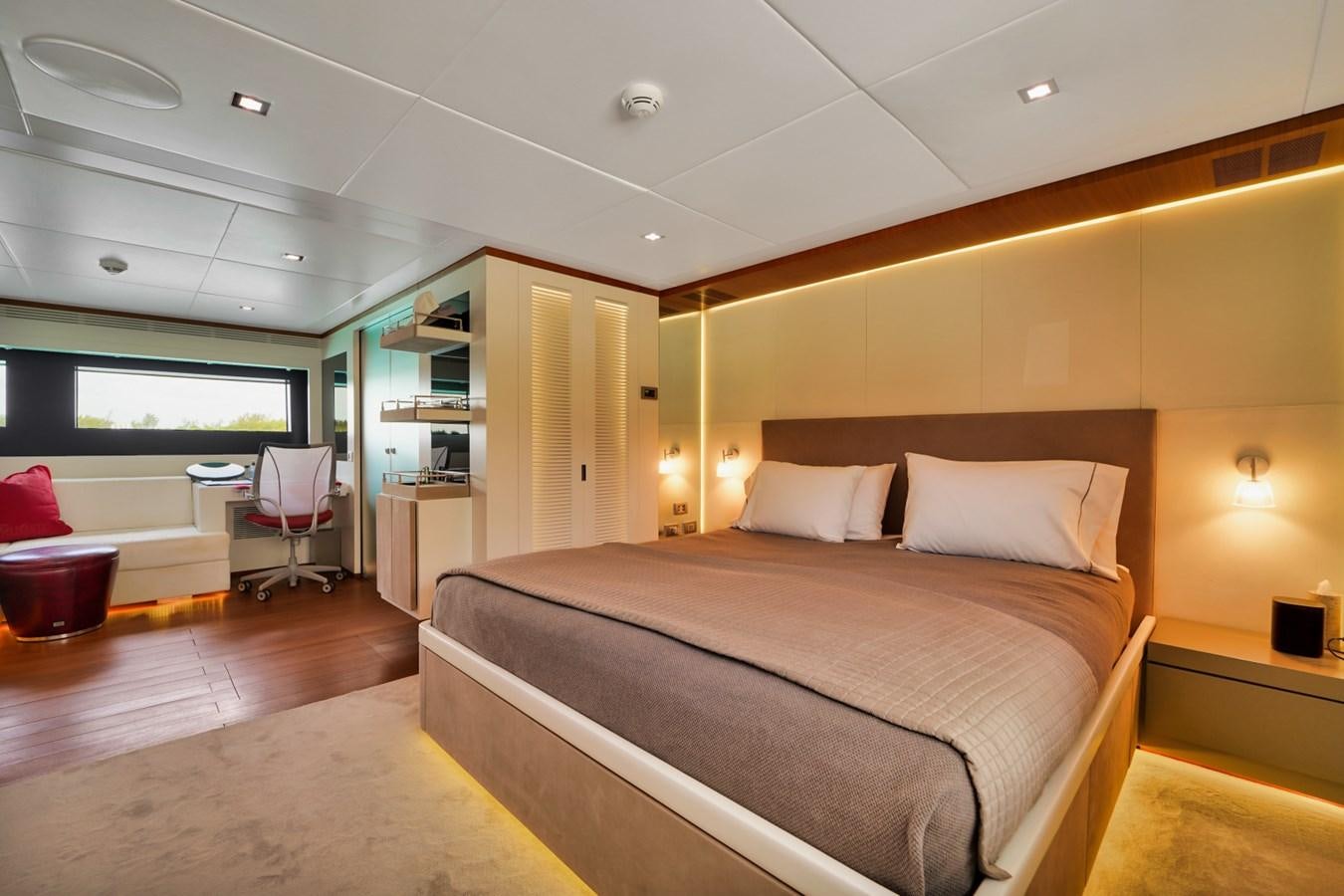 a large bedroom with a bed aboard DIAMOND Yacht for Sale