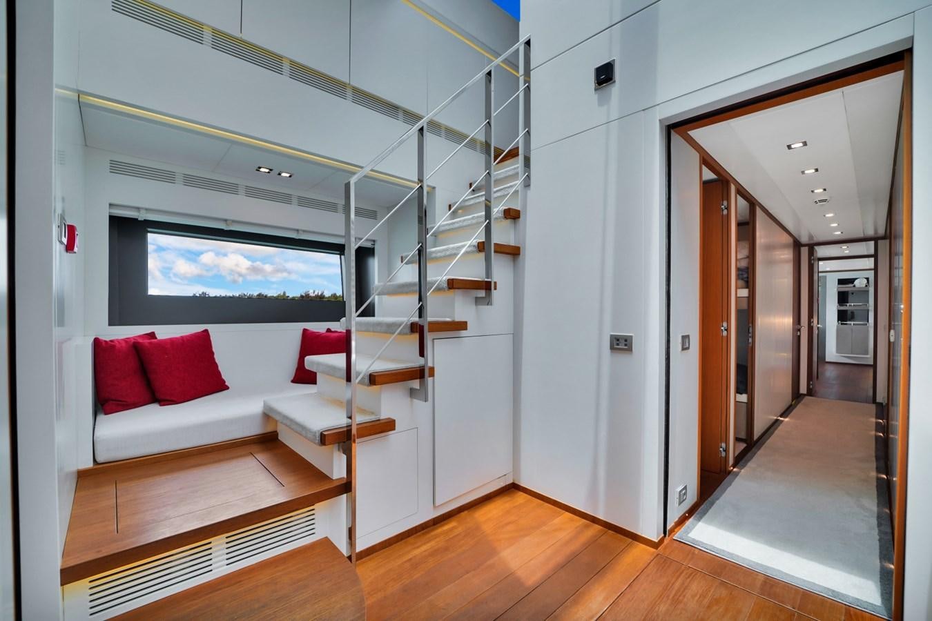 a room with a bed and a staircase aboard DIAMOND Yacht for Sale