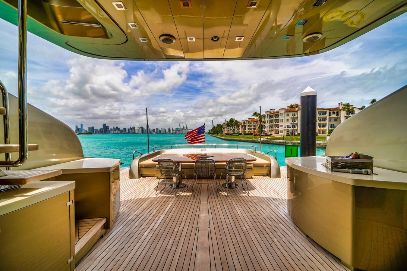 a deck with a pool and a deck with a flag on it aboard DIAMOND Yacht for Sale