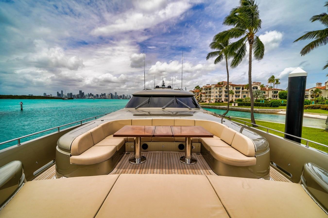 a pool with a table and chairs by the water aboard DIAMOND Yacht for Sale