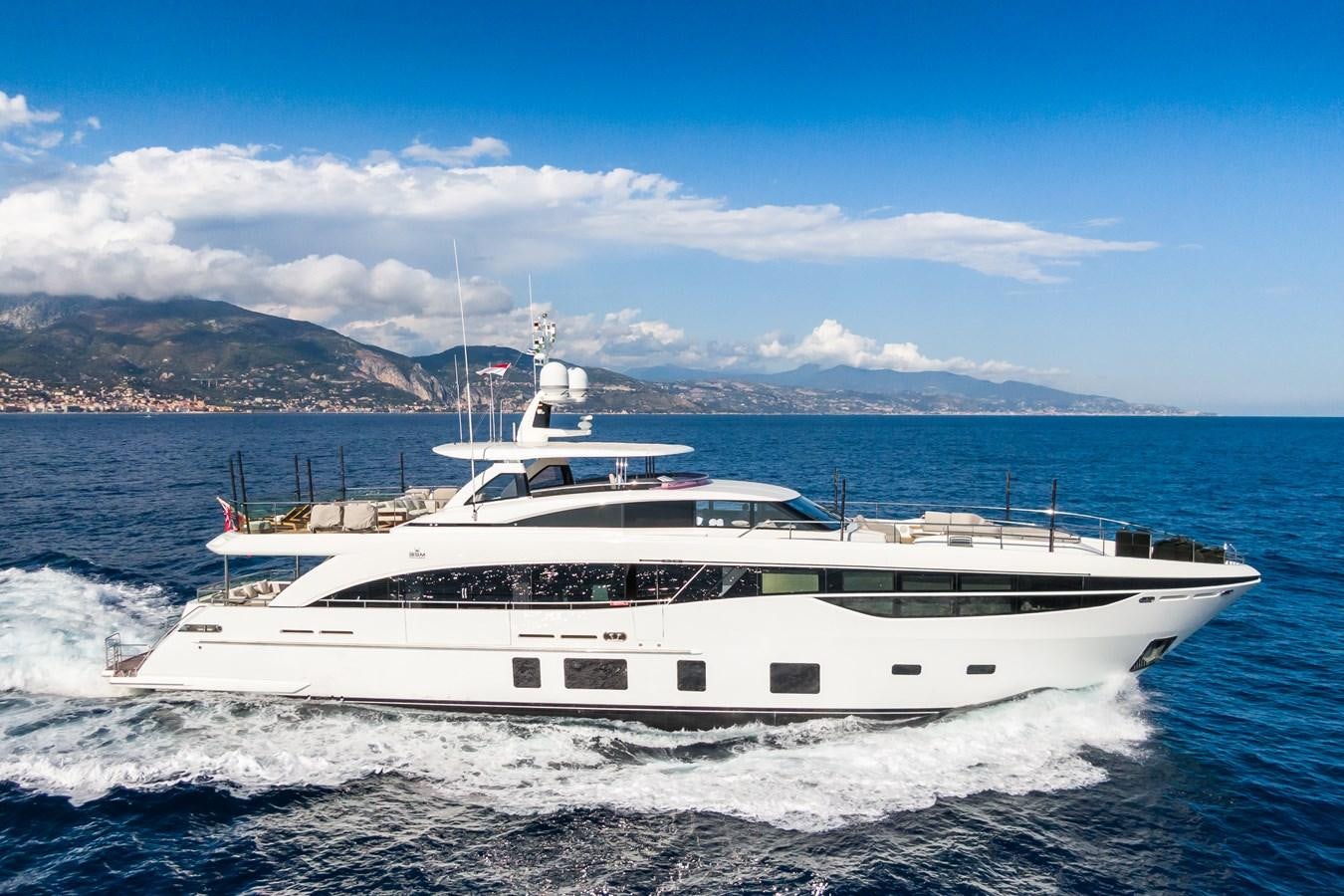 a white yacht on the water aboard MINOR FAMILY AFFAIR Yacht for Sale