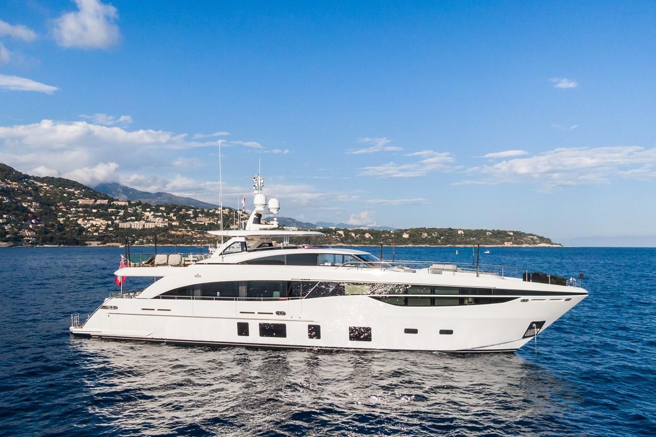a white yacht on the water aboard MINOR FAMILY AFFAIR Yacht for Sale