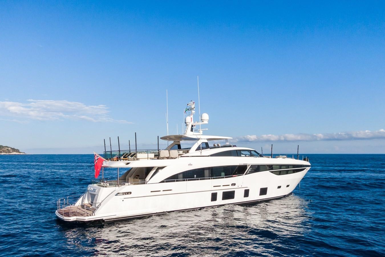 a white yacht on the water aboard MINOR FAMILY AFFAIR Yacht for Sale