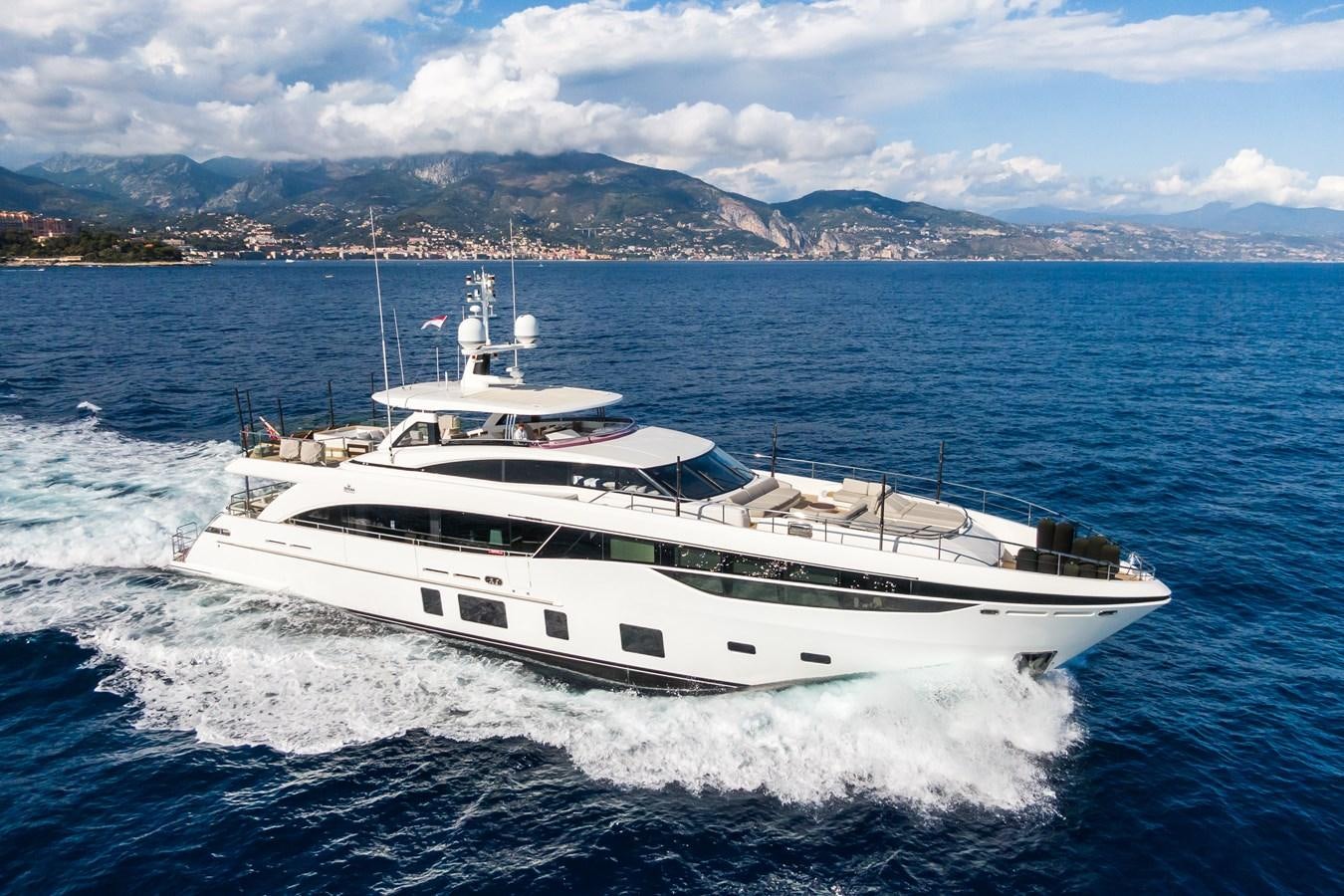 a white yacht on the water aboard MINOR FAMILY AFFAIR Yacht for Sale