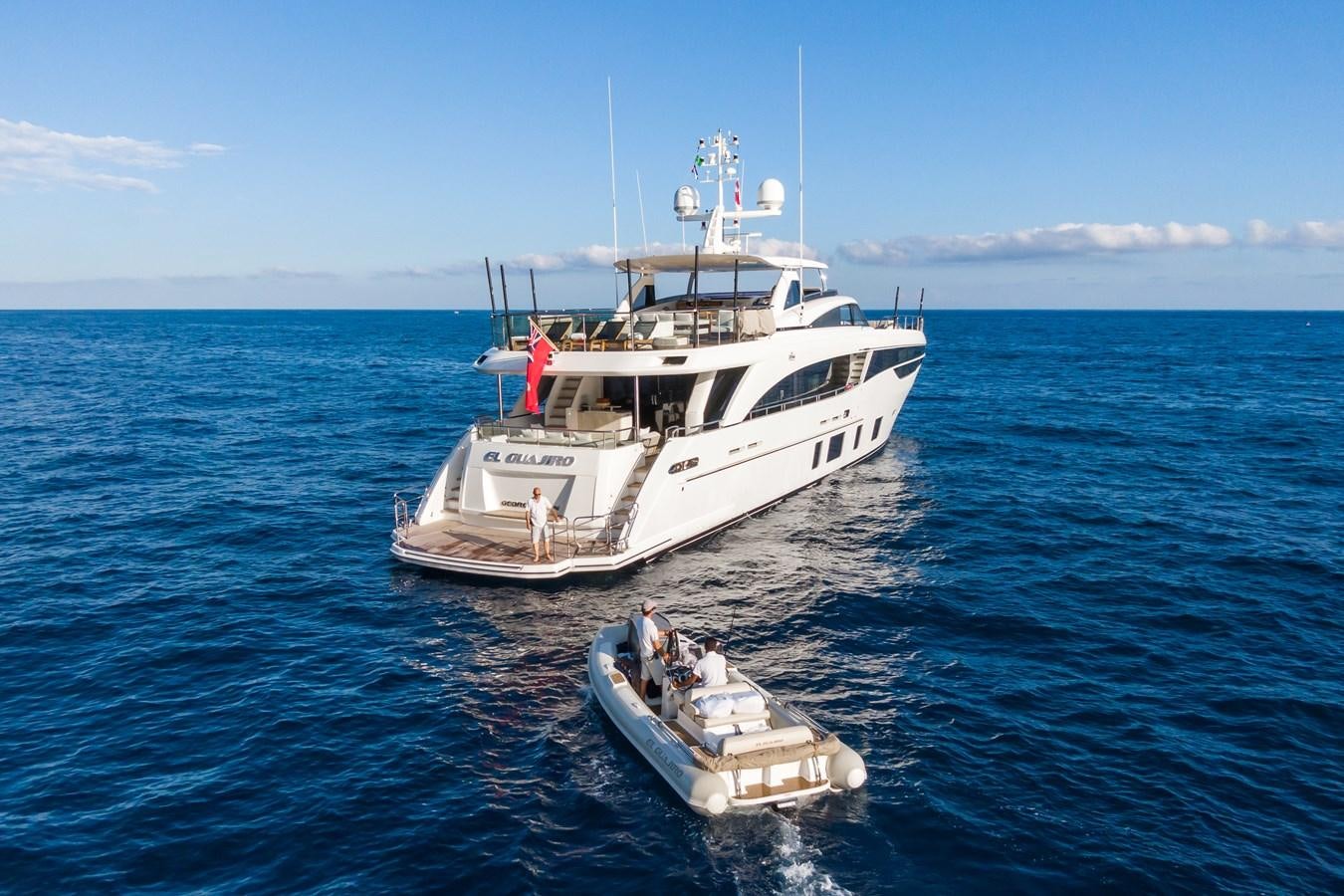 a boat with a motor boat on the water aboard MINOR FAMILY AFFAIR Yacht for Sale