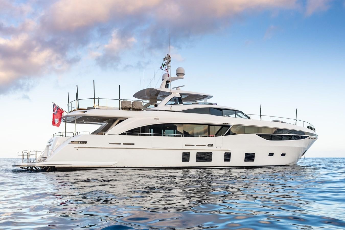 a white yacht in the water aboard MINOR FAMILY AFFAIR Yacht for Sale